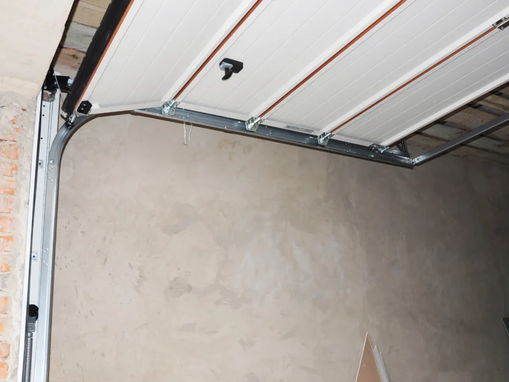 broken garage door track in a residential home